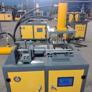 Hydraulic tube end forming machine with digital control panel and pressure gauge, yellow and gray industrial design, for reducing and shaping steel tube ends